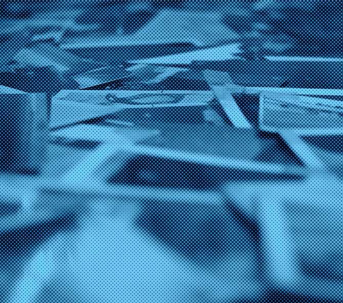 A stack of Polaroid photos. 